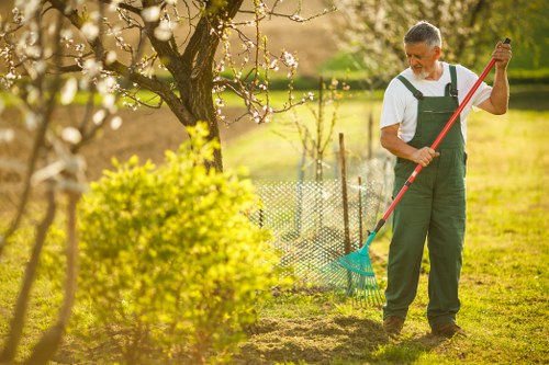 Inspector documenting lawn condition during review